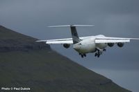 ex Faroejet BAe 146, OY-FJE now operated by Atlantic Airways taking off from Vagar Airport. Shows the difficult operating conditions faced by the crew.  Photo  Paul Dubois Collection