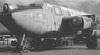 Photographed on 6/10/87 at Cape Town Harbour, waiting to be loaded on a ship for Durban, en route to Midmar Dam. The wings have been removed, outboard of the inner engines. The propellor mechanisms have also been removed as had the entire tailpiece. Photo   Wally Grieg