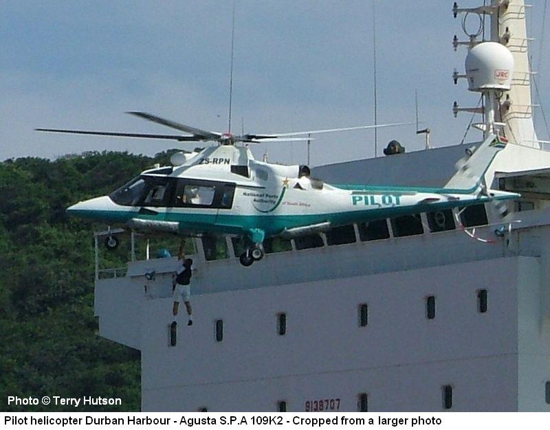 Ship pilot being delivered on board by Agusta SPA 109K2 helicopter