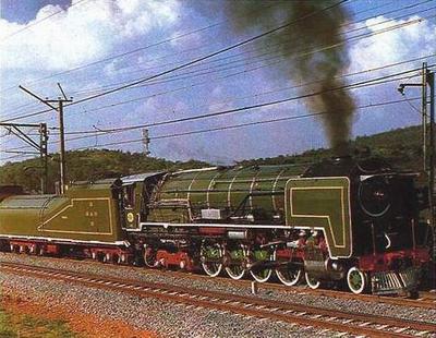 Class 25 NC just outside Pretoria, with a steam special.