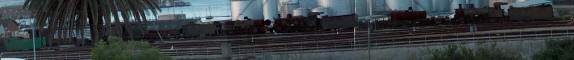 Line up of rusting narrow gauge locomotives at Humewood Road Station in Port Elizabeth