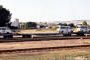 Dune Express/Shongololo Express flat car with tour vans. Photo  Robert Adams