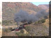 15F 2985 bursts out of the cutting on the lower leg of the horseshoe curve.