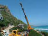 Accident Awareness Photos - Cement Truck being recovered after going through a wall and down a bank.